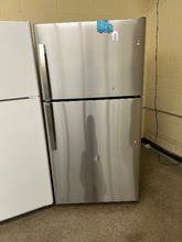 Load image into Gallery viewer, GE 21.9 cu ft Garage Ready Stainless Steel Top Freezer Refrigerator - 7327