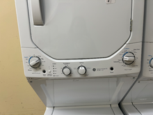 Load image into Gallery viewer, GE 2.3 Cu. Ft. Washer and 4.4 Cu. Ft. Electric Dryer Laundry Center - 7295