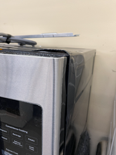 Load image into Gallery viewer, GE 1.6 cu ft OTR Stainless Microwave - 5107