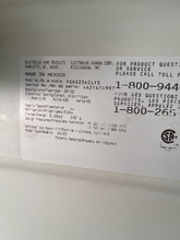Load image into Gallery viewer, Frigidaire Stainless Side by Side Refrigerator - 5669