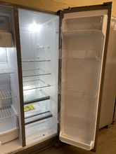 Load image into Gallery viewer, Whirlpool - 24.6 Cu. Ft. Stainless Side-by-Side Refrigerator - 6084