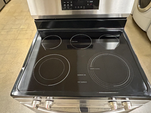 Load image into Gallery viewer, Frigidaire Stainless Slide-In Electric Stove - 7679