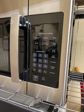Load image into Gallery viewer, GE - 1.6 Cu. Ft. Stainless OTR Microwave - 5990
