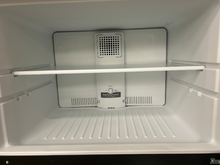 Load image into Gallery viewer, GE 21.9 cu ft Garage Ready Stainless Steel Top Freezer Refrigerator - 7327