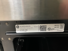 Load image into Gallery viewer, GE Stainless Slide In Electric Stove - 5600