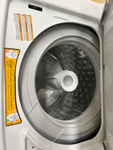 Load image into Gallery viewer, GE 2.3 Cu. Ft. Washer and 4.4 Cu. Ft. Electric Dryer Laundry Center - 7295