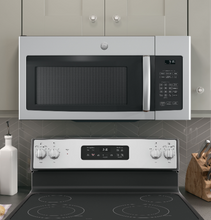 Load image into Gallery viewer, Brand New GE Stainless Microwave Oven w/ Recirculating Venting - JNM3163RJSS