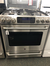 Load image into Gallery viewer, GE Stainless Slide in Dual Gas/Electric Stove - 4550