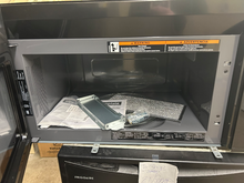 Load image into Gallery viewer, Whirlpool Stainless Steel Over the Range Microwave - 7605
