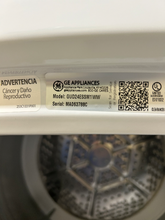 Load image into Gallery viewer, GE 2.3 Cu. Ft. Washer and 4.4 Cu. Ft. Electric Dryer Laundry Center - 7295
