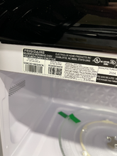 Load image into Gallery viewer, Frigidaire Gallery 1.9 Cu. Ft. OTR Stainless Microwave - 6355
