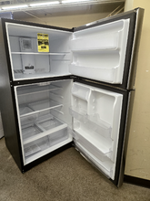 Load image into Gallery viewer, GE 21.9 cu ft Garage Ready Stainless Steel Top Freezer Refrigerator - 7329
