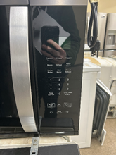 Load image into Gallery viewer, Whirlpool Stainless Steel Over the Range Microwave - 7605
