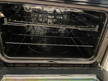 Load image into Gallery viewer, GE Cafe Stainless Slide in Double Electric Stove - 3873
