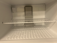 Load image into Gallery viewer, Whirlpool 20.5 cu ft Stainless Steel Refrigerator - 7657
