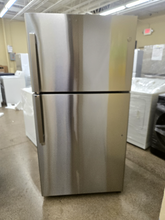Load image into Gallery viewer, GE 21.9 cu ft Garage Ready Stainless Steel Top Freezer Refrigerator - 7329
