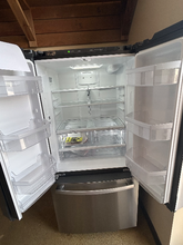 Load image into Gallery viewer, GE 18.6 cu ft Stainless Steel French Door Refrigerator - 7324
