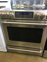 Load image into Gallery viewer, GE Stainless Slide-In Electric Stove - 2397
