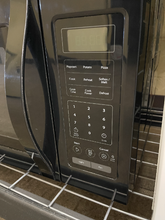 Load image into Gallery viewer, Whirlpool Black Microwave - 1117
